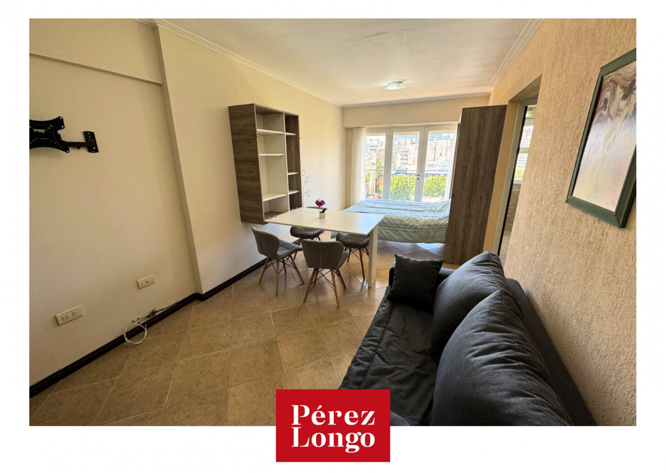 Departamento de un ambiente con balcond